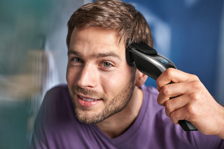 Philips HAIRCLIPPER Series 9000 Regolacapelli con pettini motorizzati e lame in titanio