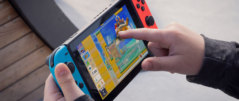 Nintendo Switch V2 2019 console da gioco portatile 15,8 cm (6.2") 32 GB Wi-Fi Nero, Blu, Rosso